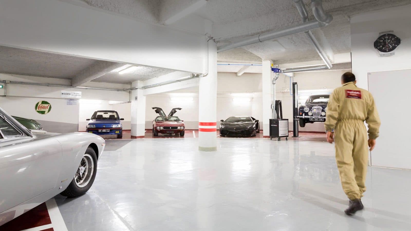 The Le Garage MMC basement with classic cars lined up
